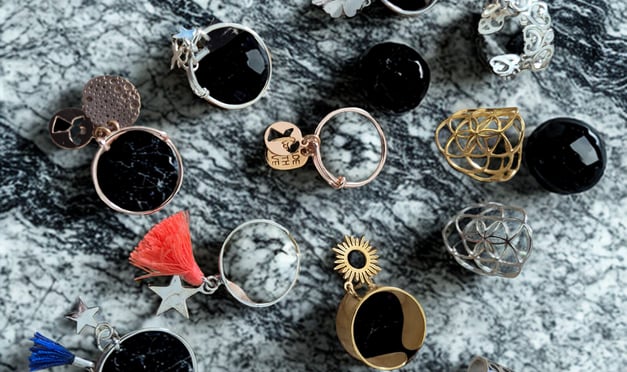 a bunch of rings and rings with a black and white background