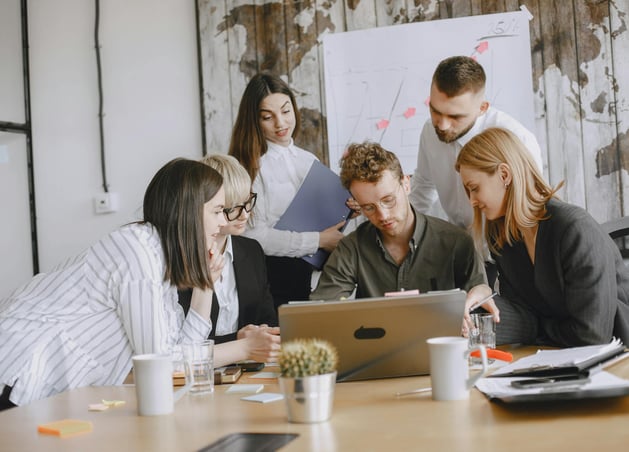 Taritan Solutions team collaborating with corporate client on staffing needs