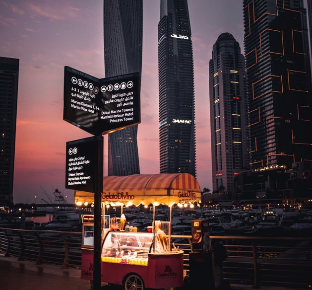a food truck parked in front of a building Dubai street food