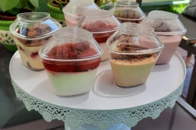 a cake with desserts and desserts on a cake plate