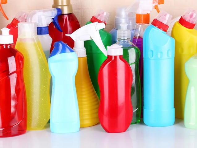 plastic household cleaning products cluttering the home