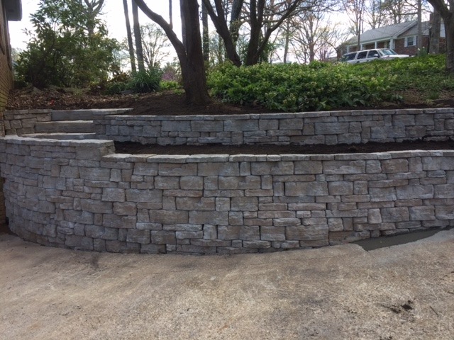 designed stamped concrete retaining wall Concrete Contractors Huntsville AL