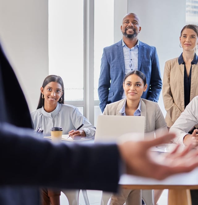Professionals listening to a speaker