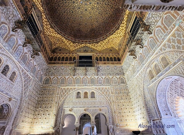 an unbelievably beautiful grand room with an ornate dome in Mudejar Palace in Seville