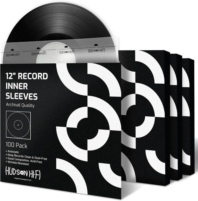 a record player's record sleeved in black and white