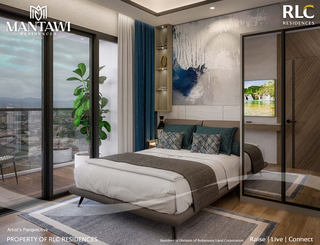 a bedroom with a large bed and a balcony