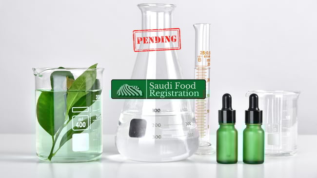 Glass labware with plant extracts and droppers labeled “Pending” under Saudi Food Registration review for product testing.