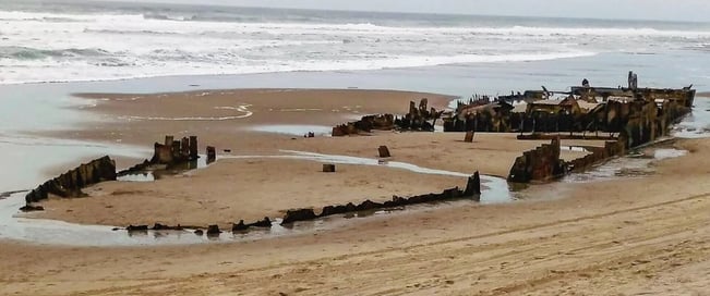 Oregon Coast - sunken steamship buried in the sand at Horsfall Beach, North Bend