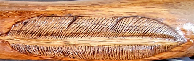 relief carved feather