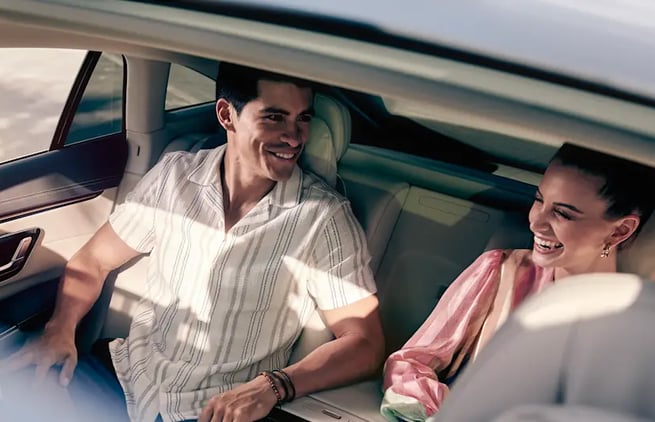 a man and woman in a car