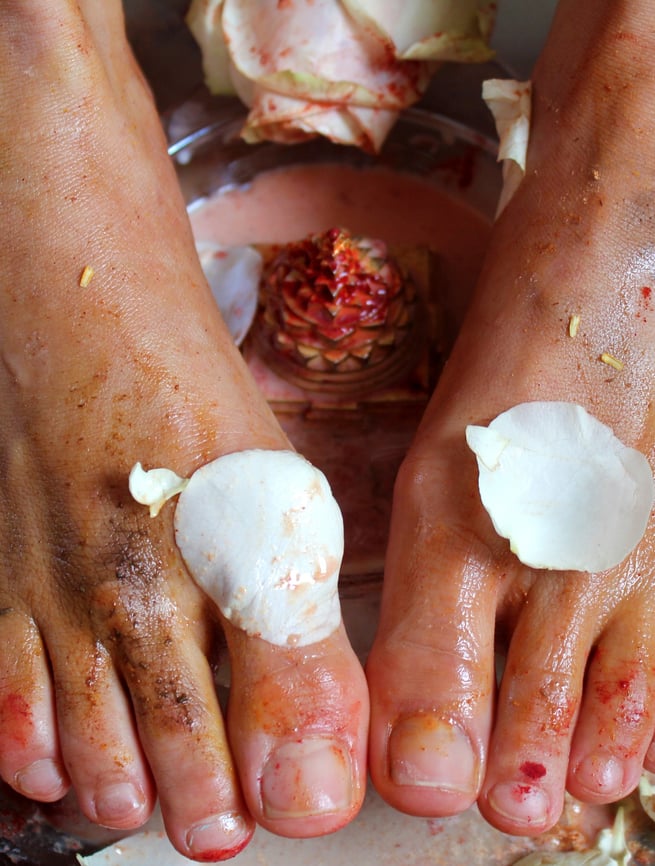 woman's feet being worshipped in tantric ritual