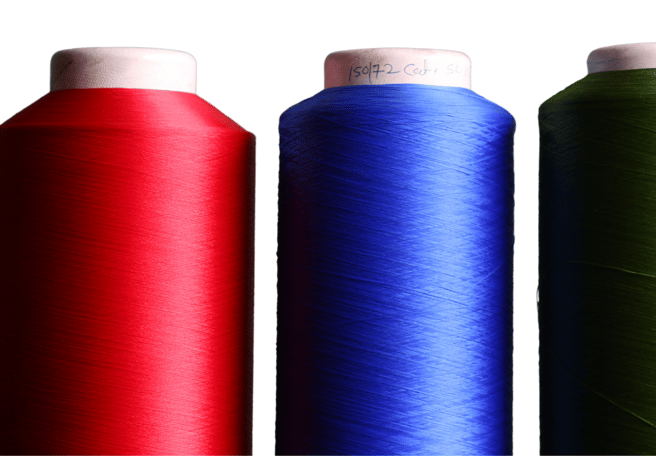 3 Polyester yarn cones in red, blue and black