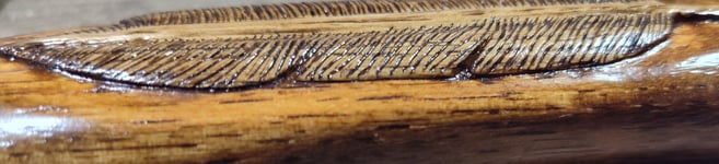 relief carved feather