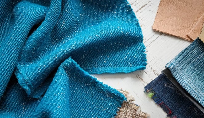 A close-up shot of a textile swatch made of recycled polyester