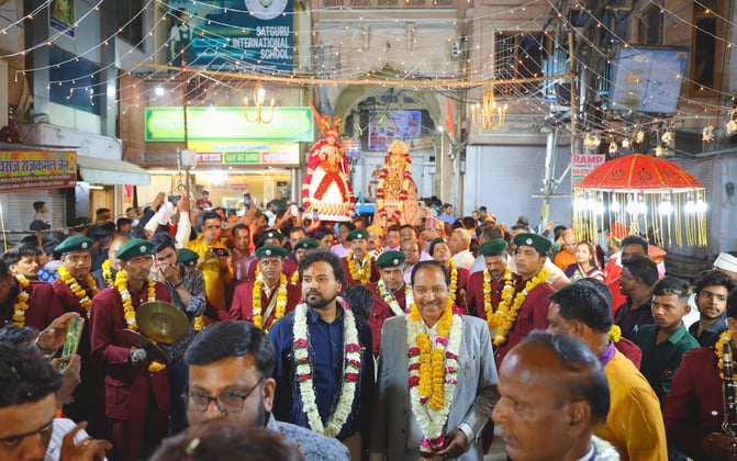 Owner Manohar Lal leading the Manohar Brass Band, with people welcoming them enthusiastically in grand Gangaur Fest.
