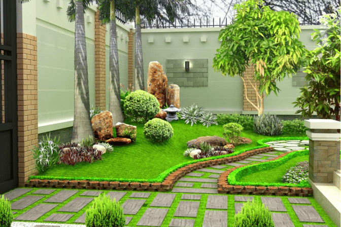 a garden with a green lawn and a stone path