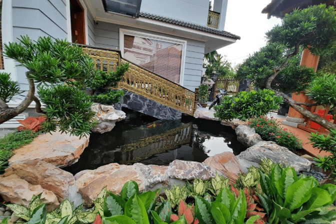 a bridge over a pond with a bridge over it