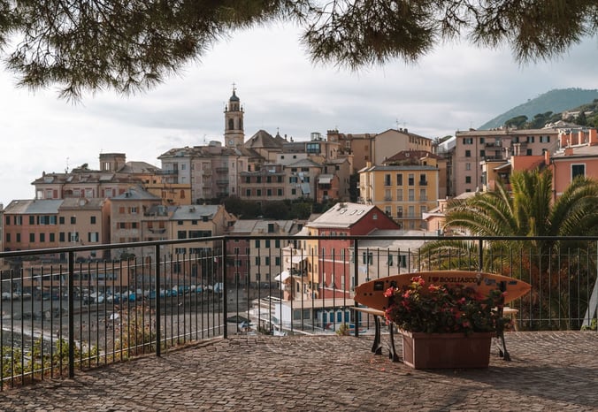 view with 'I ❤️ BOGLIASCO' planter - terracotta rooftops - church spire - Maa Beach background