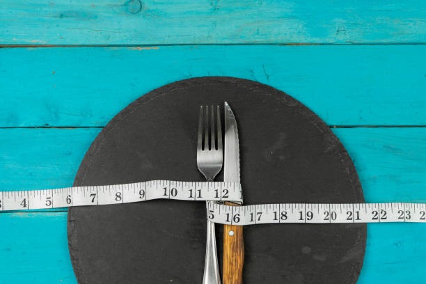 Measuring tape choking eating utensils