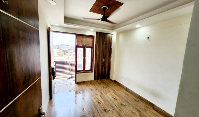 Bedroom with Balcony of 2 BHK Modern Builder Floor with Balconies — Chattarpur