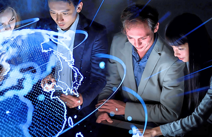 Two female and two male leaders using smart devices in front of a holographic globe