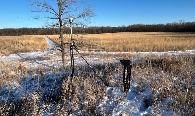 Trimble R12i with TSC7 in the winter overlooking prarie