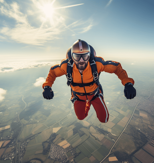 a man in orange skydiving