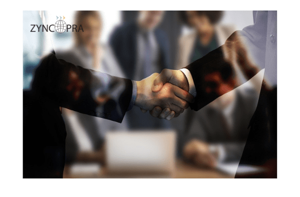 Professional handshake symbolizing trust-based distributor partnerships with Zyncopra.