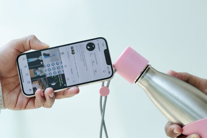 liquisip bottle with Instagram open with pink bottle