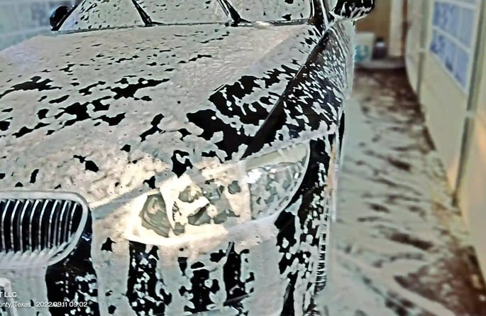 a car with a black and white paint on it