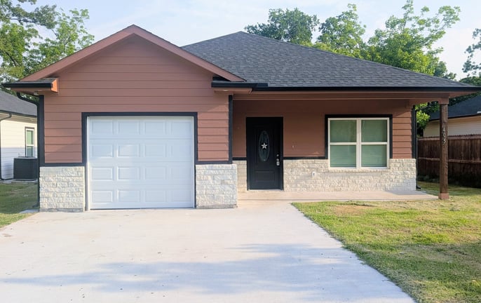 a house with a garage door