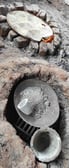"A traditional metal pot used for melting brass during the casting process in Dhokra art, Bastar, Chhattisgarh."