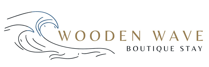 Wooden Wave boutique stay logo