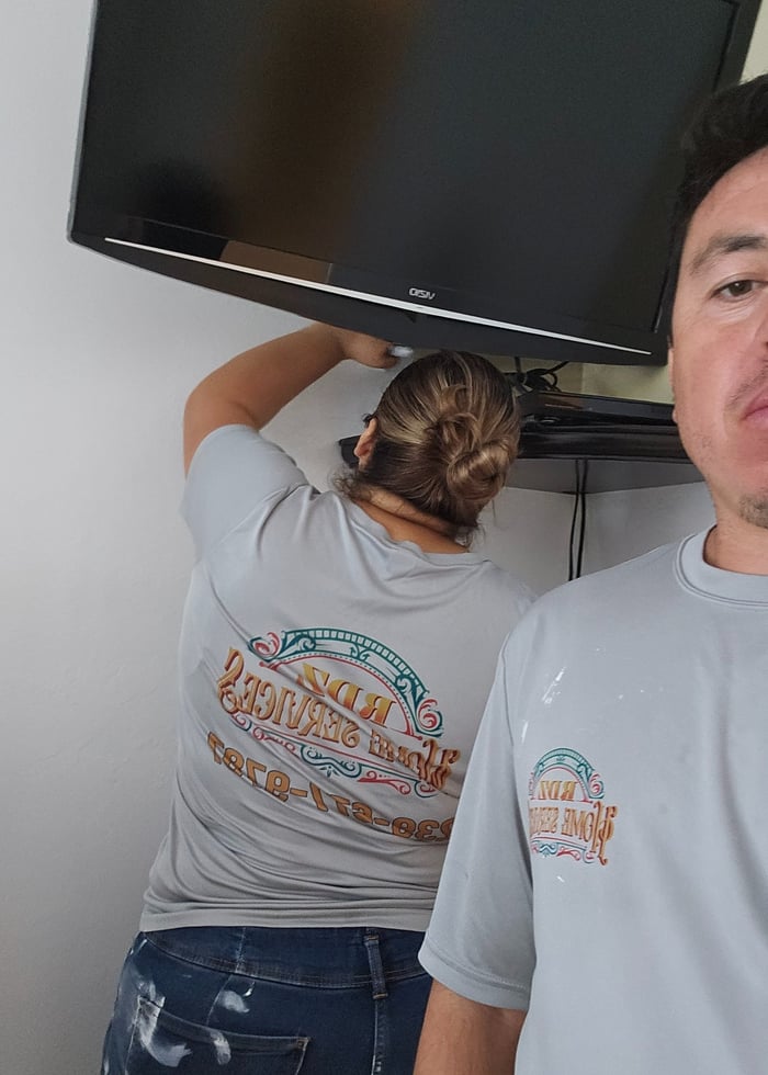 Luis and Marisol on-site for an RDZ Home Services project