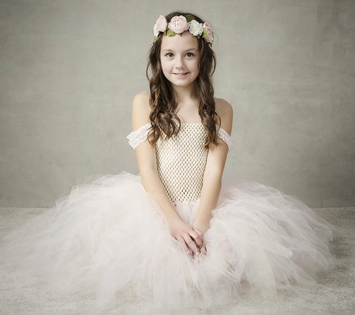 Young girl with a pale pink fairy dress