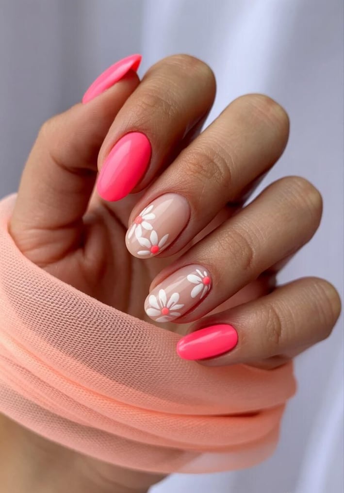 Hot pink nails with daisy flower accents