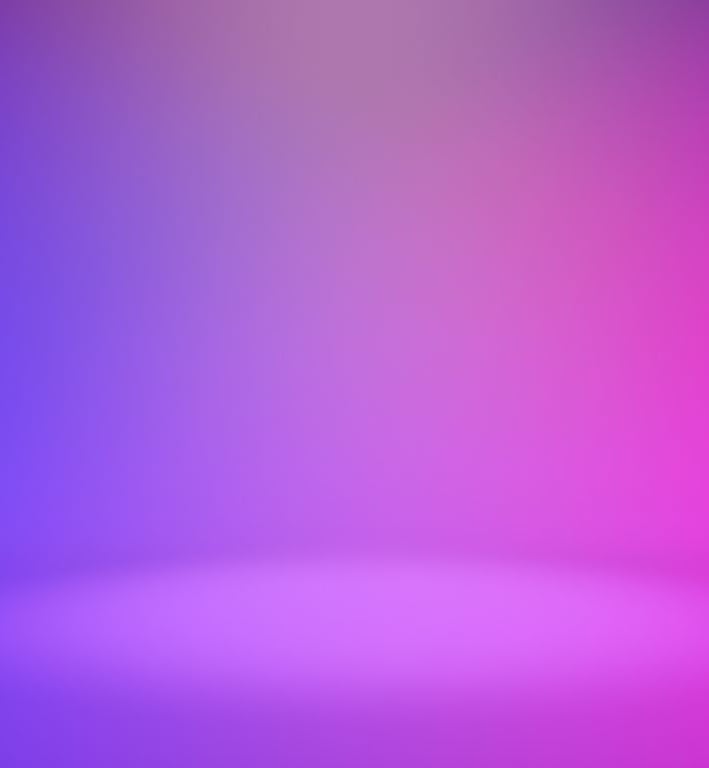 a purple and pink background with a blurry image of a blurry background