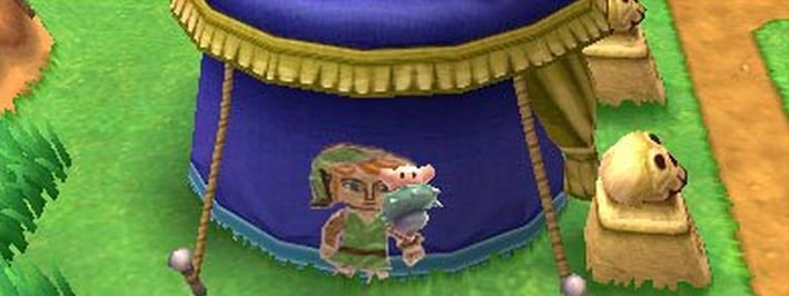 Link usando su nueva habilidad de convertirse en una pintura para llegar a nuevos lugares