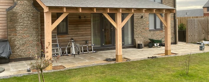 backgarden with new porch built by Lakes building and plastering services