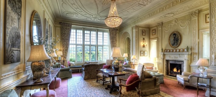 Bovey Castle's lounge with fireplace