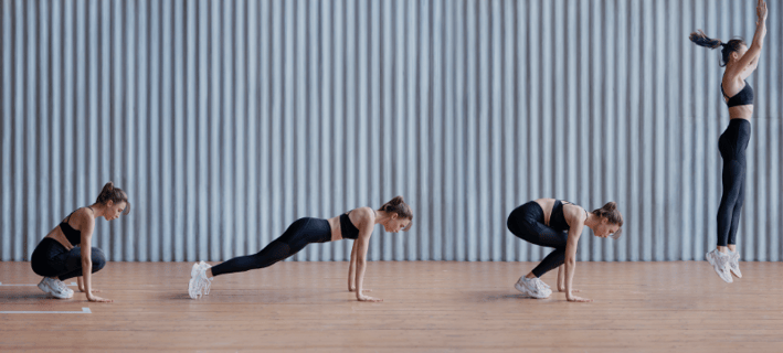 a woman doing burpees