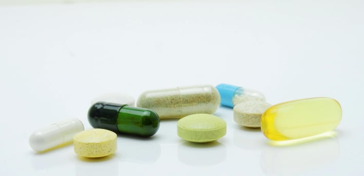 a variety of pills and pills on a table