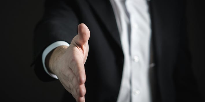 offering a hand shake