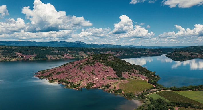 a lake with a mountain in the background