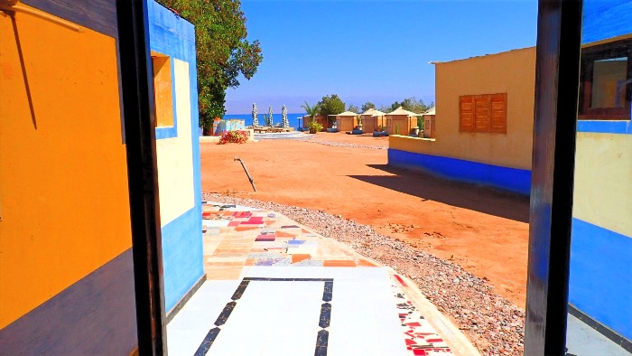 Studio door view of a beach with a view of the Red sea