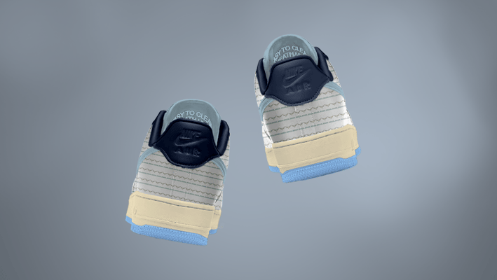 Free Nike Sneaker mockup featuring rear view of matching pair with zigzag pattern and "Nike Air" bra