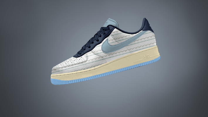 Free Nike Sneaker mockup with side view of patterned design, soft blue swoosh, and cream sole on gra