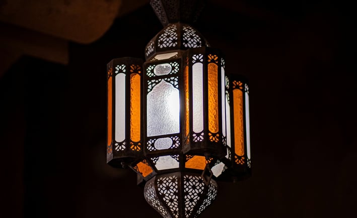 a lamp hanging from a ceiling in a room