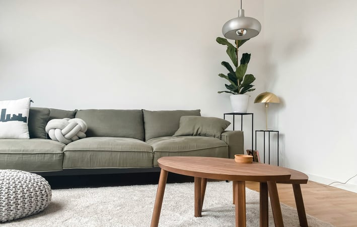 a living room with a couch and a table