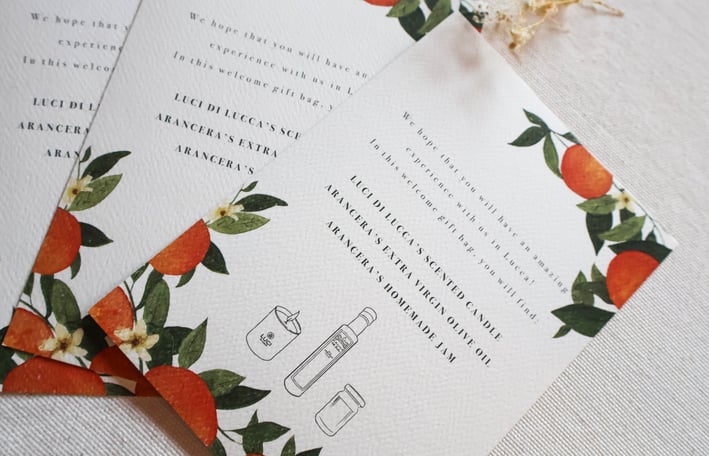 wedding suite cards for the gift bag with a candle olive old and some orange preserves
